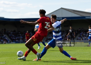 WIMBLEDON, ENGLAND - AUGUST 1: Harvey Vale of Queens Park Rangers tackles Aron Sasu of AFC Wimbledon during the pre-season friendly match between AFC Wimbledon and Queens Park Rangers at The Cherry Red Records Stadium on August 1, 2026 in Wimbledon, England. (Photo by Sarah Ray-Gain/Getty Images)