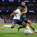 Mohammed Kudus of Tottenham Hotspur attempts a cross under pressure from Vitaliy Mykolenko of Everton during the Premier League match between Tottenham Hotspur and Everton at Tottenham Hotspur Stadium in London, United Kingdom, on September 12, 2026. (Photo by Harvey Murphy/News Images/NurPhoto via Getty Images)