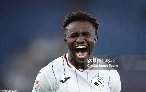 LONDON, ENGLAND - OCTOBER 13: Joseph Opoku of Swansea City celebrates at full-time following the team's victory in the Sky Bet Championship 2026/27 match between Millwall and Swansea City at The Den on October 13, 2026 in London, England. (Photo by James Fearn/Getty Images)
