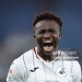 LONDON, ENGLAND - OCTOBER 13: Joseph Opoku of Swansea City celebrates at full-time following the team's victory in the Sky Bet Championship 2026/27 match between Millwall and Swansea City at The Den on October 13, 2026 in London, England. (Photo by James Fearn/Getty Images)