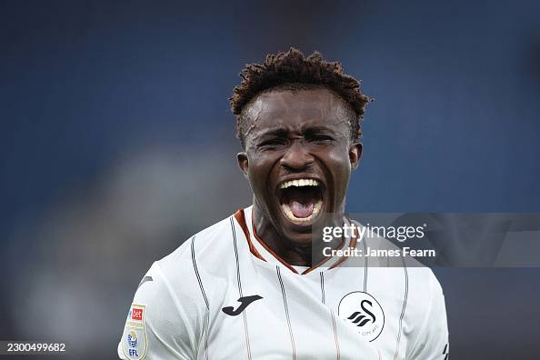 LONDON, ENGLAND - OCTOBER 13: Joseph Opoku of Swansea City celebrates at full-time following the team's victory in the Sky Bet Championship 2026/27 match between Millwall and Swansea City at The Den on October 13, 2026 in London, England. (Photo by James Fearn/Getty Images)