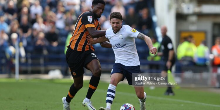 PRESTON, ENGLAND - AUGUST 06: Preston North End's Robbie Brady holds off the challenge from Hull City's Benjamin Tetteh during the Sky Bet Championship between Preston North End and Hull City at Deepdale on August 6, 2022 in Preston, United Kingdom. (Photo by Stephen White - CameraSport via Getty Images)