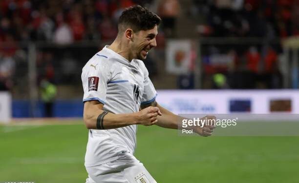 SANTIAGO, CHILE - MARCH 29: Federico Valverde of Uruguay celebrates after scoring the second goal of his team during the FIFA World Cup Qatar 2022 qualification match between Chile and Uruguay ay Estadio San Carlos de Apoquindo on March 29, 2022 in Santiago, Chile. (Photo by Alberto Valdez - Pool/Getty Images)