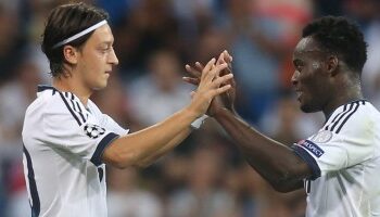 Ex-Ghana star Michael Essien congratulates Mesut Ozil as he retires from football