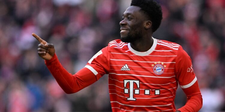 Bayern Munich's Canadian midfielder Alphonso Davies reacts after scoring during the German first division Bundesliga football match between Bayern Munich and Augsburg in Munich on March 11, 2023. (Photo by Christof STACHE / AFP) / DFL REGULATIONS PROHIBIT ANY USE OF PHOTOGRAPHS AS IMAGE SEQUENCES AND/OR QUASI-VIDEO (Photo by CHRISTOF STACHE/AFP via Getty Images)