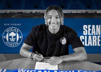 Wigan Athletic sign English-born Ghanaian defender Sean Clare on a three-year deal