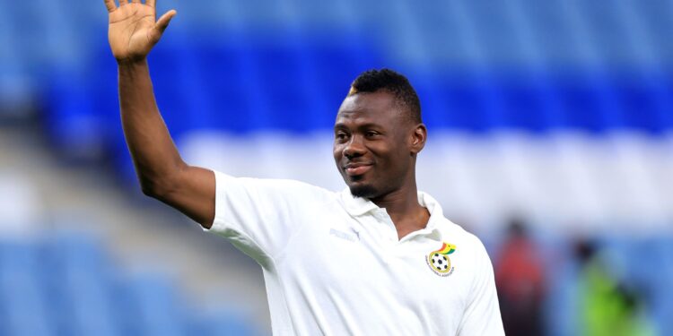 AL WAKRAH, QATAR - DECEMBER 02: Ibrahim Danlad of Ghana waves during the pitch inspection prior to the FIFA World Cup Qatar 2022 Group H match between Ghana and Uruguay at Al Janoub Stadium on December 02, 2022 in Al Wakrah, Qatar. (Photo by Buda Mendes/Getty Images)
