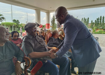 Ex-President John Kufuor congratulates GFA capo Kurt Okraku on re-election