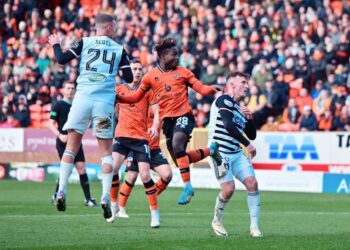 Dundee United coach Jim Goodwin applauds Mathew Anim Cudjoe for outstanding performance in comeback victory against Queens Park