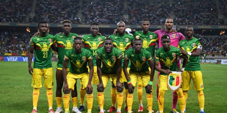 Mali players pose for a team photo during the Group F Africa Cup of Nations (CAN) 2021 football match between Mali and Mauritania at Stade de Japoma in Douala on January 20, 2022. (Photo by CHARLY TRIBALLEAU / AFP) (Photo by CHARLY TRIBALLEAU/AFP via Getty Images)