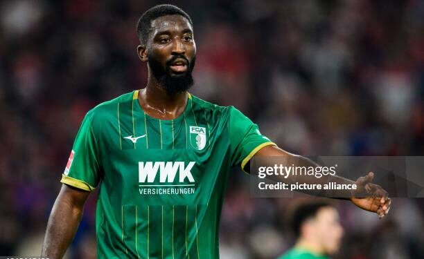 20 December 2023, Baden-Württemberg, Stuttgart: Soccer: Bundesliga, VfB Stuttgart - FC Augsburg, Matchday 16, MHPArena. Augsburg's Patric Pfeiffer gesticulates. Photo: Tom Weller/dpa - IMPORTANT NOTE: In accordance with the regulations of the DFL German Football League and the DFB German Football Association, it is prohibited to utilize or have utilized photographs taken in the stadium and/or of the match in the form of sequential images and/or video-like photo series. (Photo by Tom Weller/picture alliance via Getty Images)
