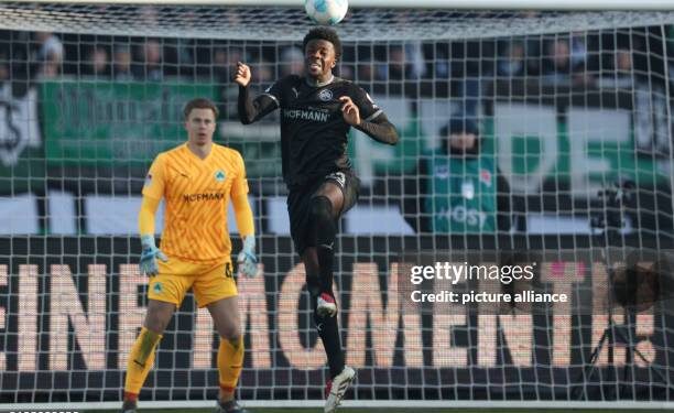 18 January 2025, North Rhine-Westphalia, Münster: Soccer, Bundesliga 2, SC Preußen Münster - SpVgg Greuther Fürth, Matchday 18 at Stadion an der Hammer Straße (Preußenstadion). Fürth's Gideon Jung heads the ball. Photo: Friso Gentsch/dpa - IMPORTANT NOTE: In accordance with the regulations of the DFL German Football League and the DFB German Football Association, it is prohibited to utilize or have utilized photographs taken in the stadium and/or of the match in the form of sequential images and/or video-like photo series. (Photo by Friso Gentsch/picture alliance via Getty Images)