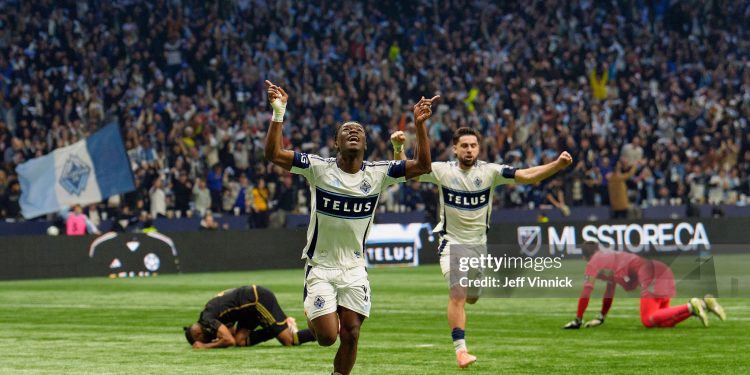 VANCOUVER, BRITISH COLUMBIA - NOVEMBER 22: Emmanuel Sabbi #11 of Vancouver Whitecaps FC celebrates scoring his team's first goal during the conference semifinal between Vancouver Whitecaps FC and Los Angeles Football Club at BC Place as part of the 2025 MLS Cup Playoffs on November 22, 2025 in Vancouver, British Columbia. (Photo by Jeff Vinnick/Getty Images)